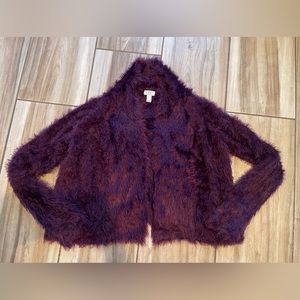 Logo by Lori Goldstein Cardigan